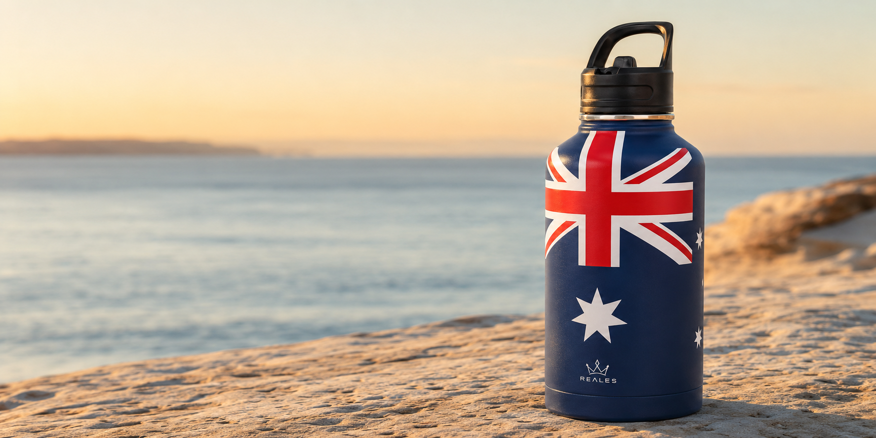REALES Australian Flag bottle on the Australian coast
